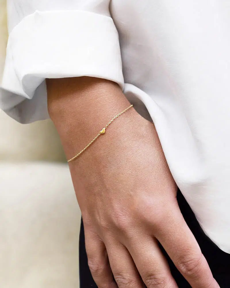 Loving heart drop bracelet gold